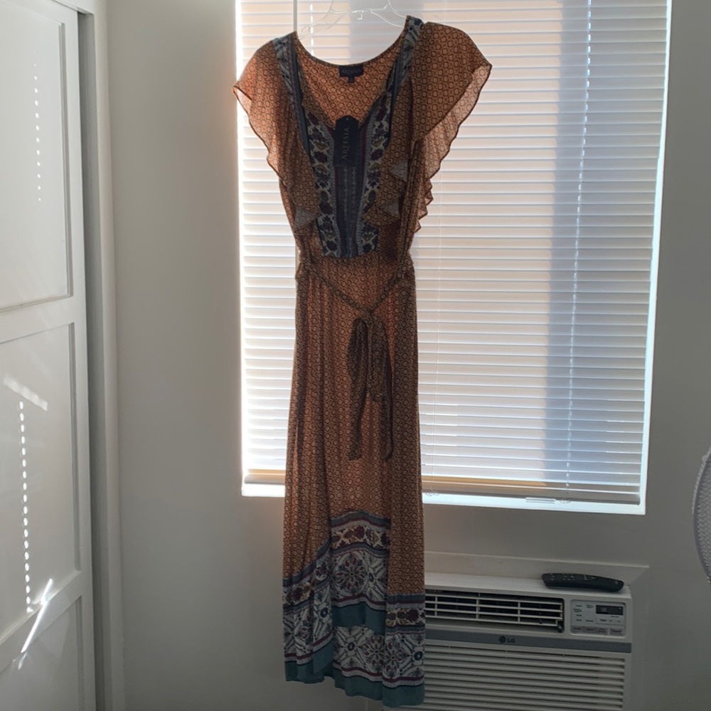 Brand new, never worn with tag still on it.